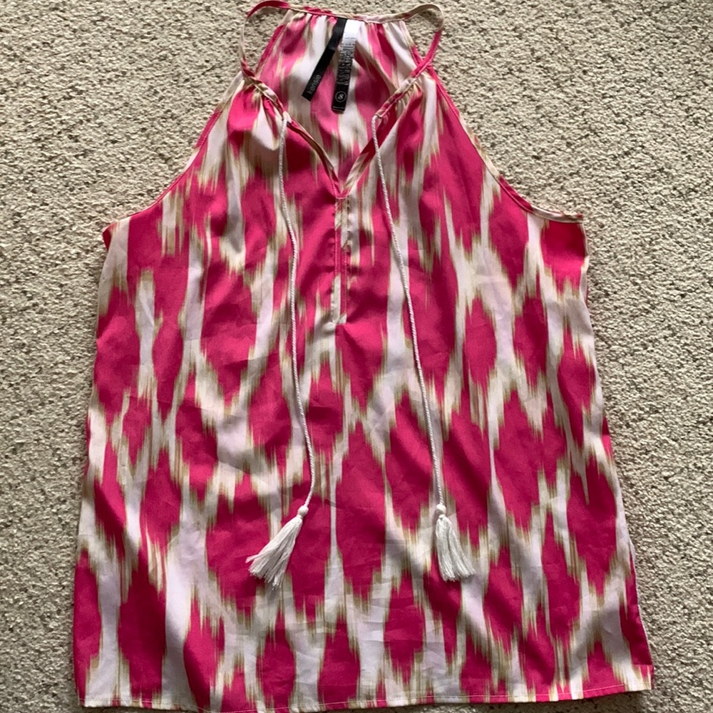 Sleeveless top with tassels